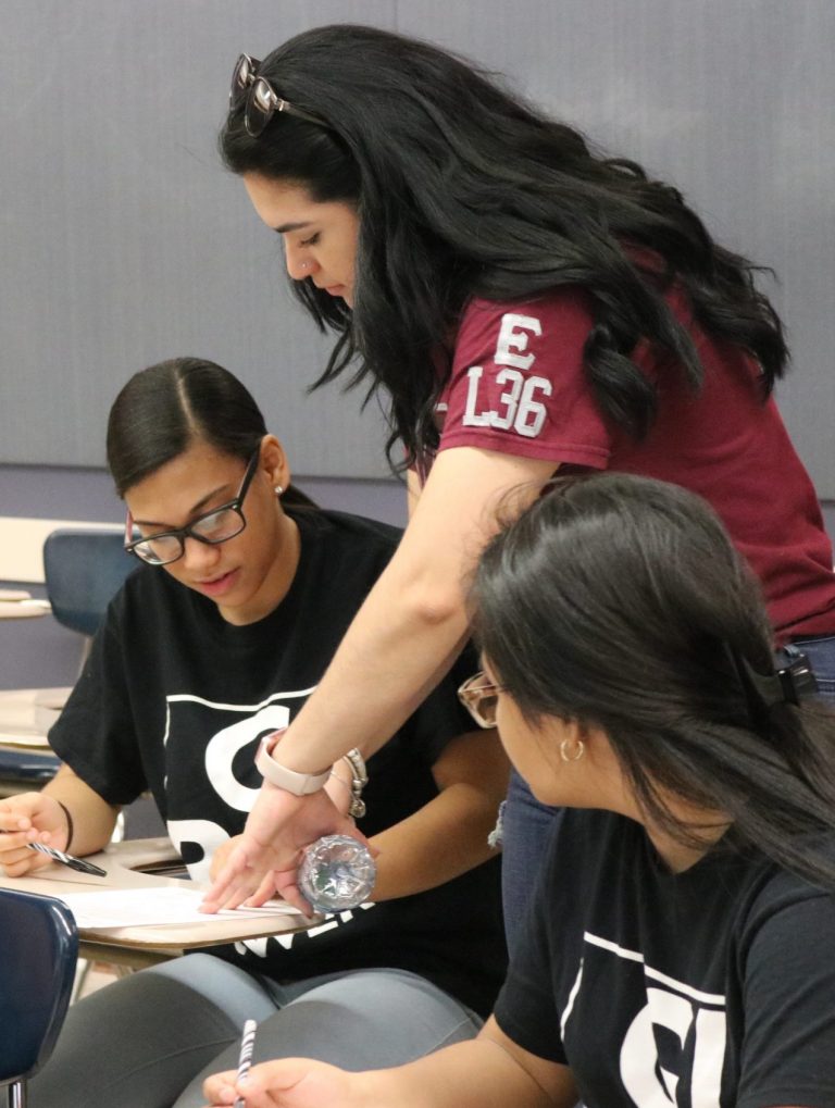 Aspire High staff giving advises to students